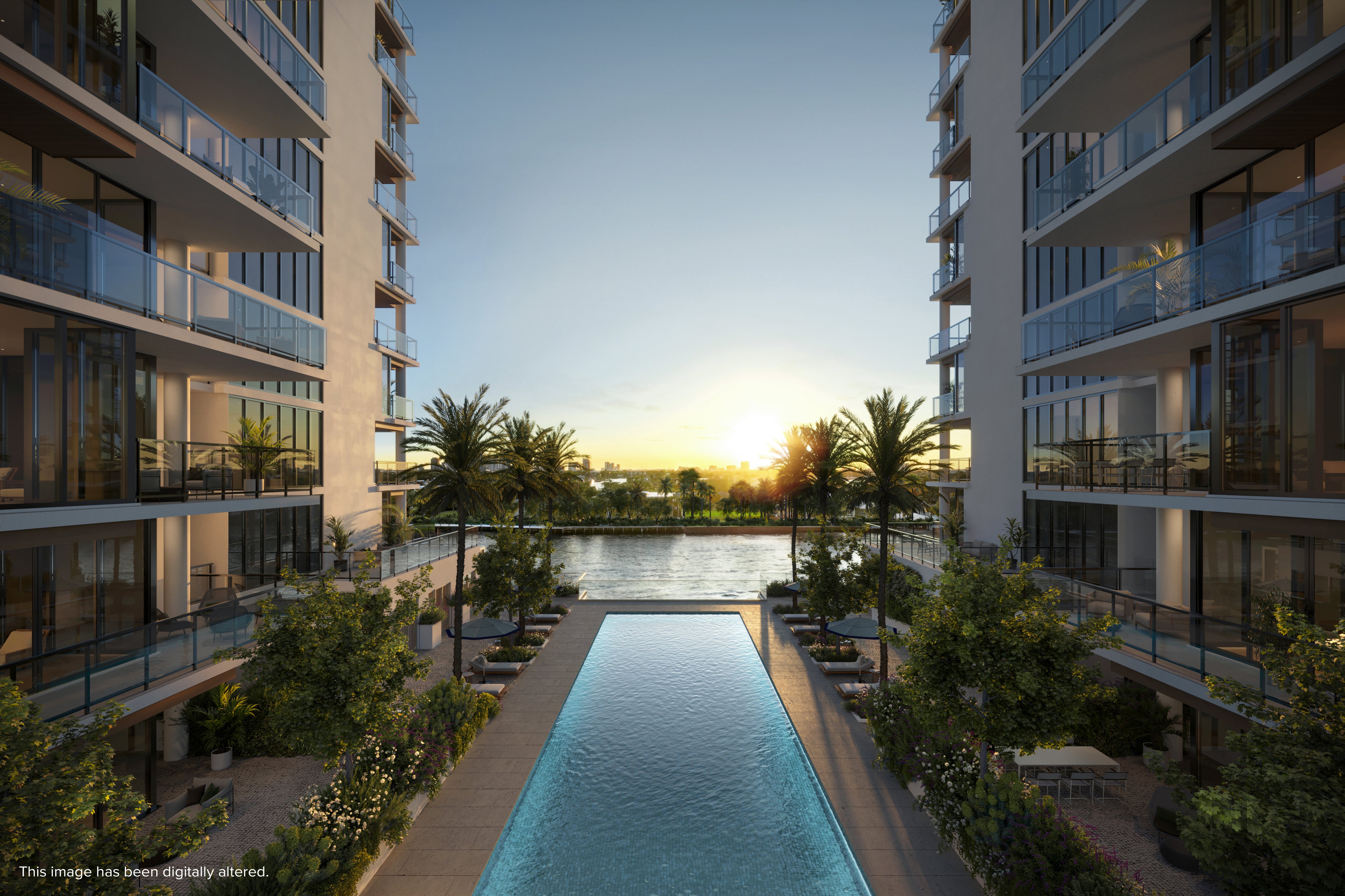 Rendering of the courtyard pool between the two towers at The Ritz-Carlton Residences, Fort Lauderdale Beach at sunset