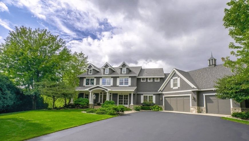 This Gurtek Custom Homes estate offers luxury, privacy, and an easy Twin Cities commute.
