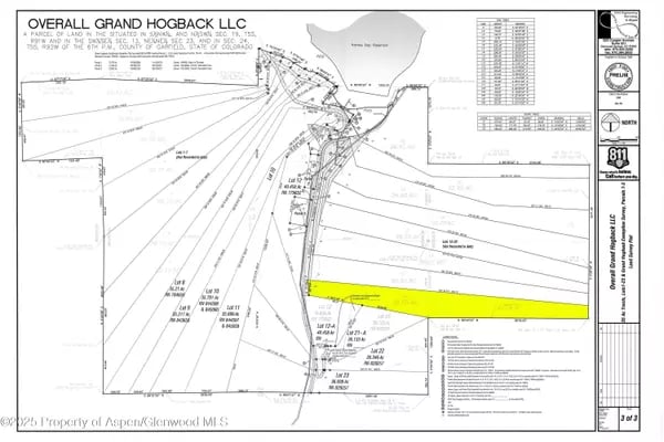 Subdivision plat with a long parcel highlighted in yellow.