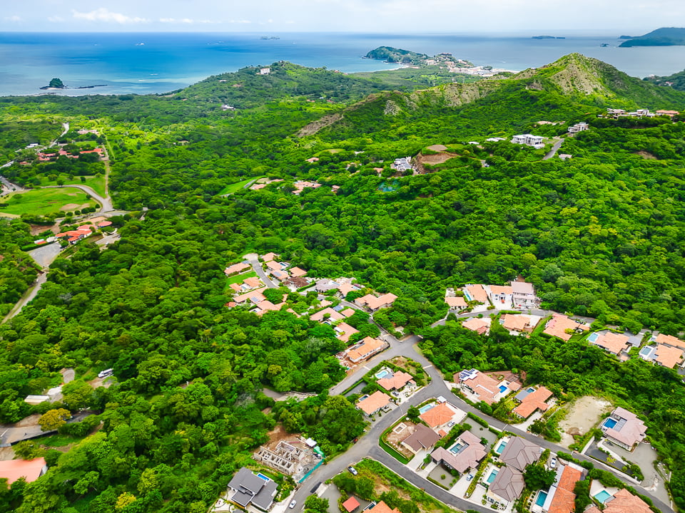 Casa Coralina | Elegant Home in Top Gated Community with Private Pool, Lush Gardens, & Incredible Amenities.  Located on a Double Lot w/ Ocean View!