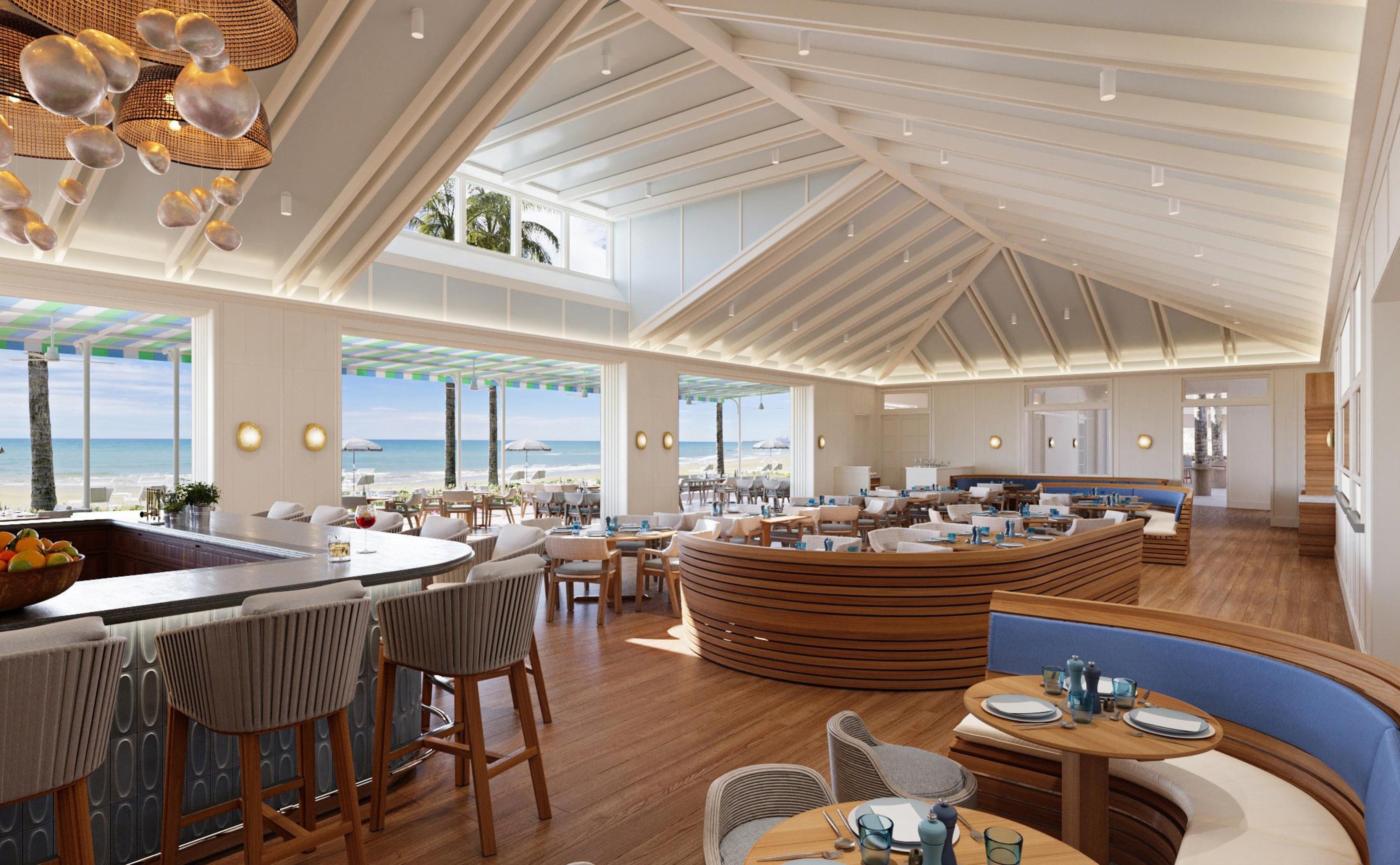 Rendering of a clubhouse dining room with a vaulted ceiling at Naples Beach Club