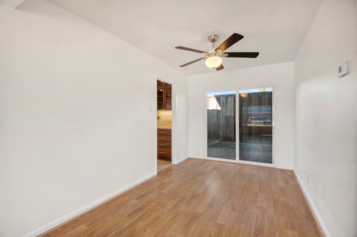 Living room with sliding door at 1401 and 1403 Cary Avenue, San Mateo