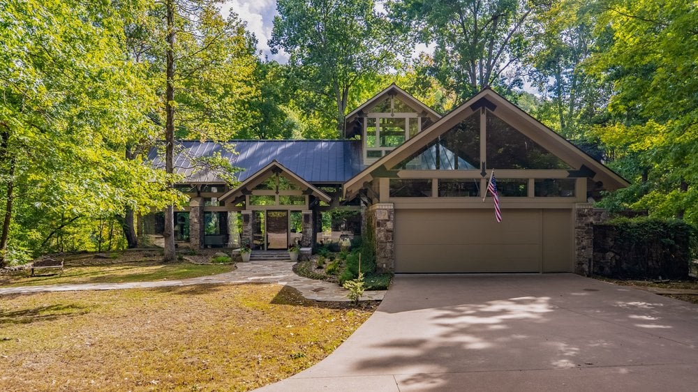 Custom-built Tailwater Lodge exterior with stone and timber design