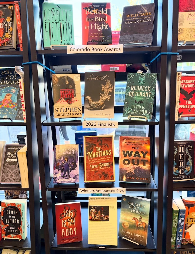 Bookshelves inside an independent bookstore in Denver