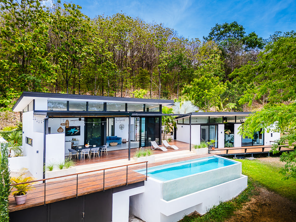 Casa Kalachuchi | Gorgeous Modern Jungle Oasis with Sunset Views in Gated Community