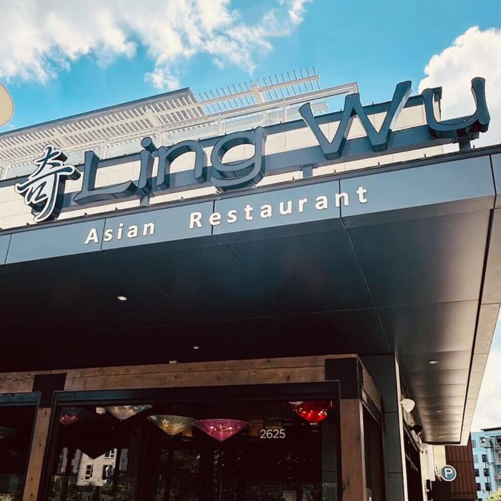 People toasting with wine glasses