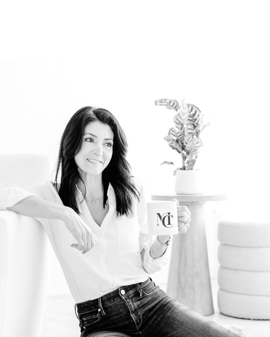 Melissa Clark having relaxing conversation holding a cup of coffee, Central Massachusetts real estate agent