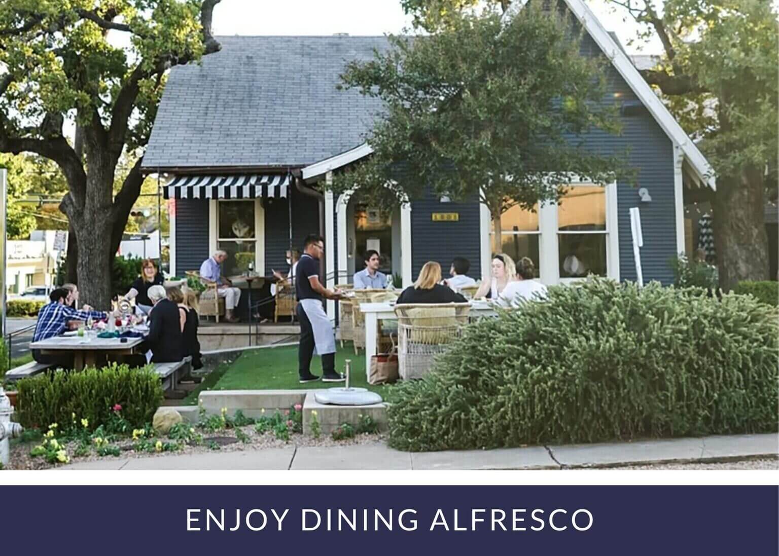 People toasting with wine glasses