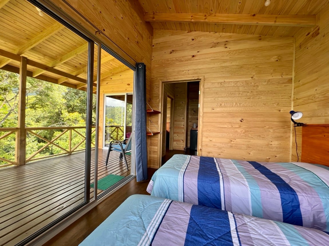 Eco-Luxury Home and Cabins with Waterfall, Ocean Views, and Organic Farming Potential