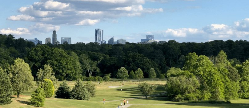 Chastain Park Luxury Home - Beautiful modern residence surrounded by lush greenery, showcasing elegant architecture and upscale living in a prime real estate location.