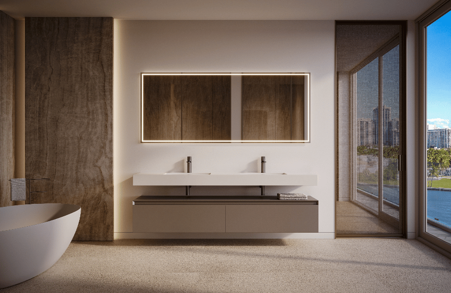 Modern bathroom with a freestanding tub, double vanity, and floor-to-ceiling windows overlooking water.