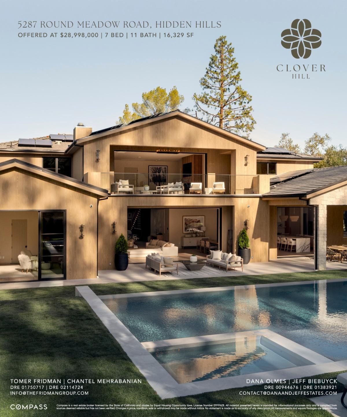 Modern wood-clad Hidden Hills home with open living areas and a swimming pool with a shallow ledge.