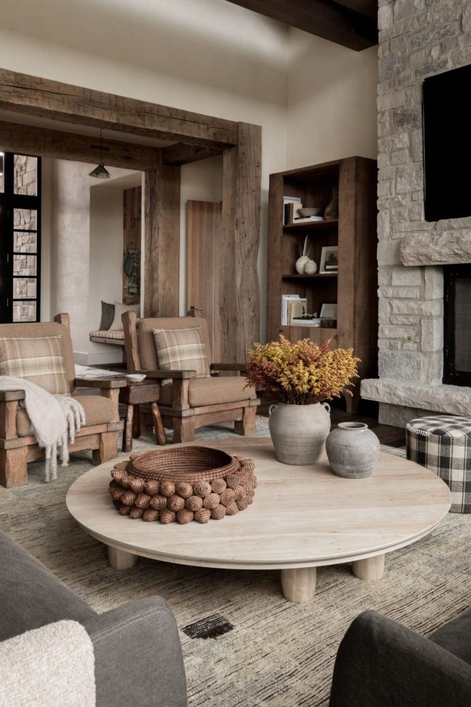 Refined luxury interior with natural wood and stone elements, conveying timeless design and elevated real estate representation aligned with the values of Amy Ali and Agency West in California.