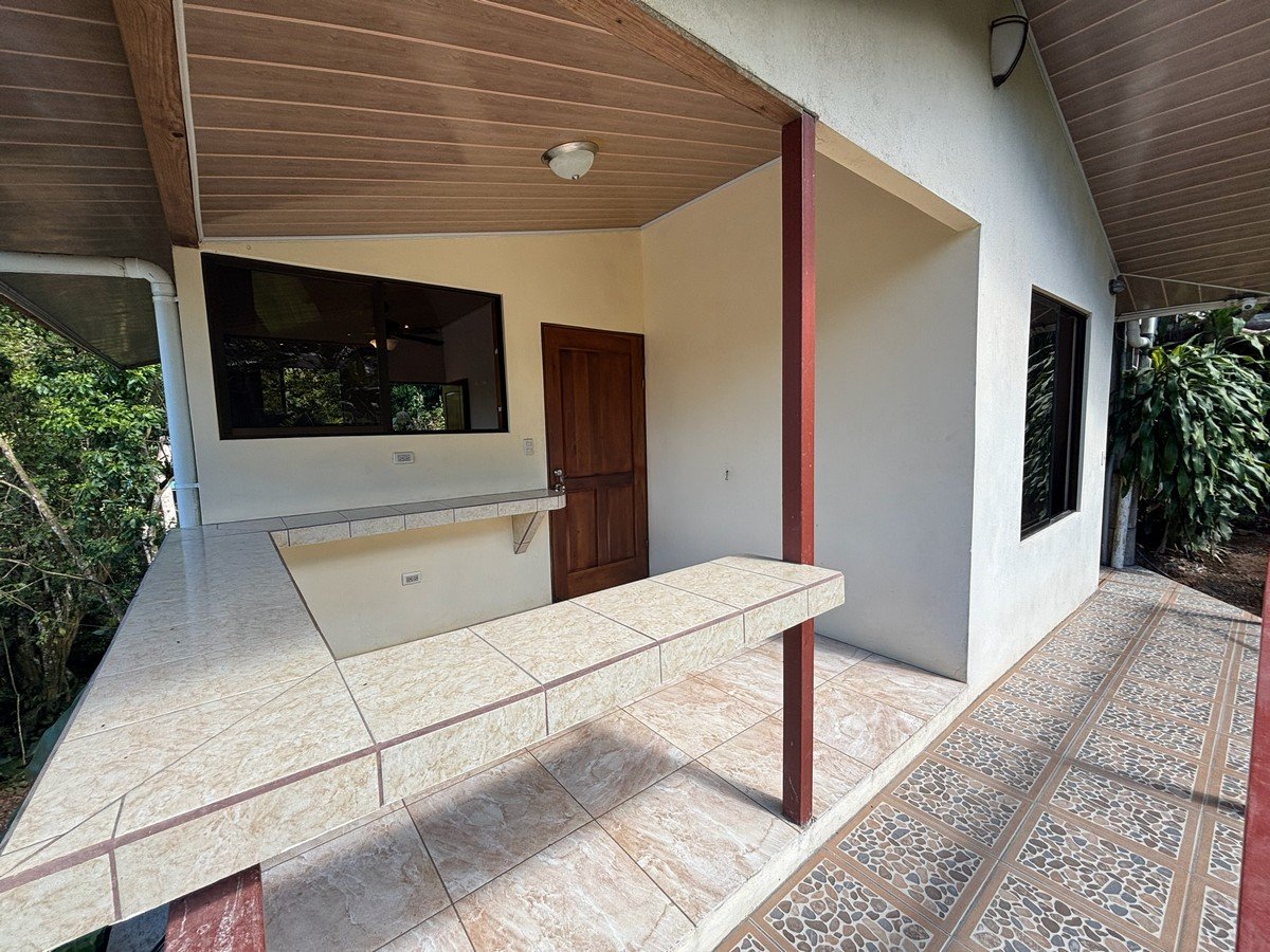 0.16 Acres – 4 Living Units, 7 Bedroom Riverfront Investment Package Near Dominical Beach With Owner Financing!!!