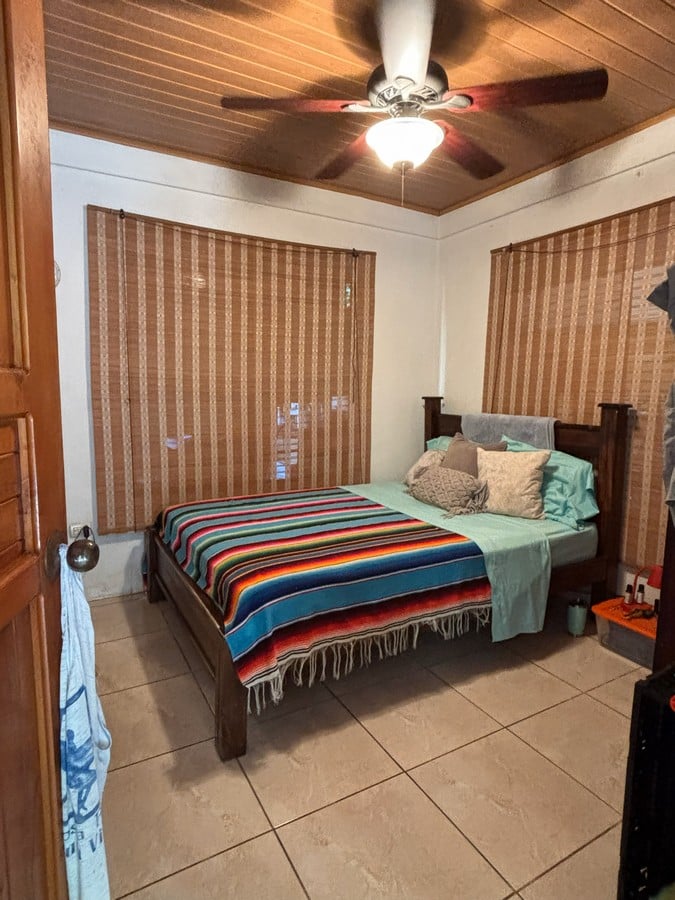 0.16 Acres – 4 Living Units, 7 Bedroom Riverfront Investment Package Near Dominical Beach With Owner Financing!!!