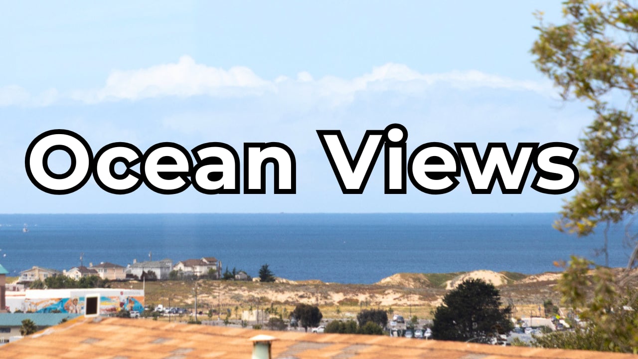 1626 Darwin St Seaside CA home for sale with ocean views, new flooring, and natural light