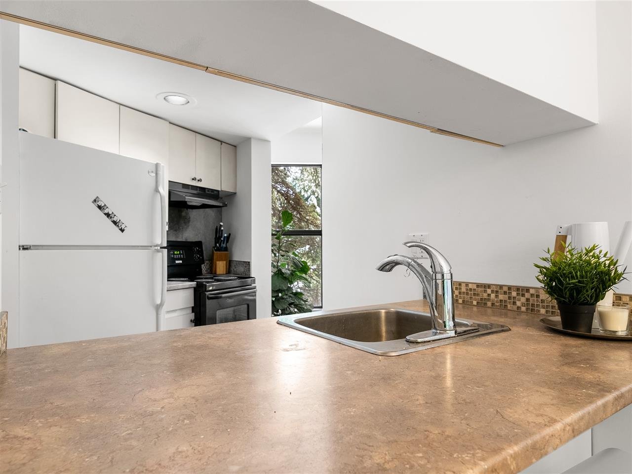 12-2561 Tricouni Pl