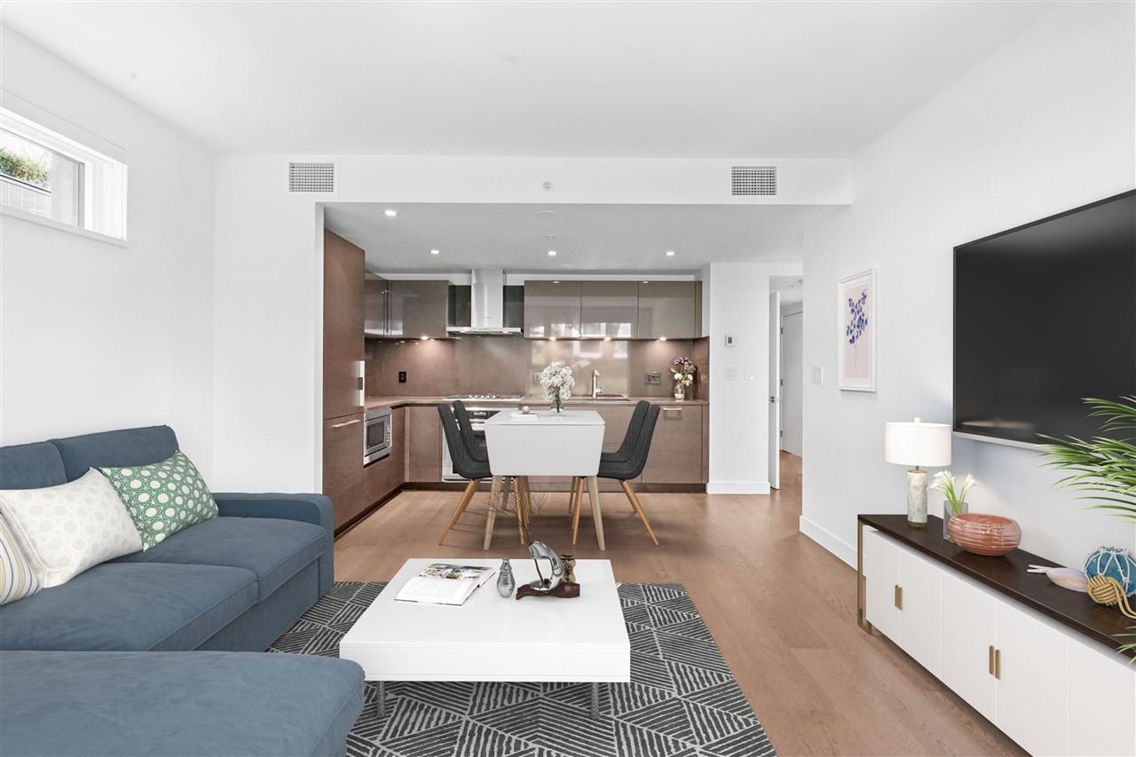 203-7128 Adera St