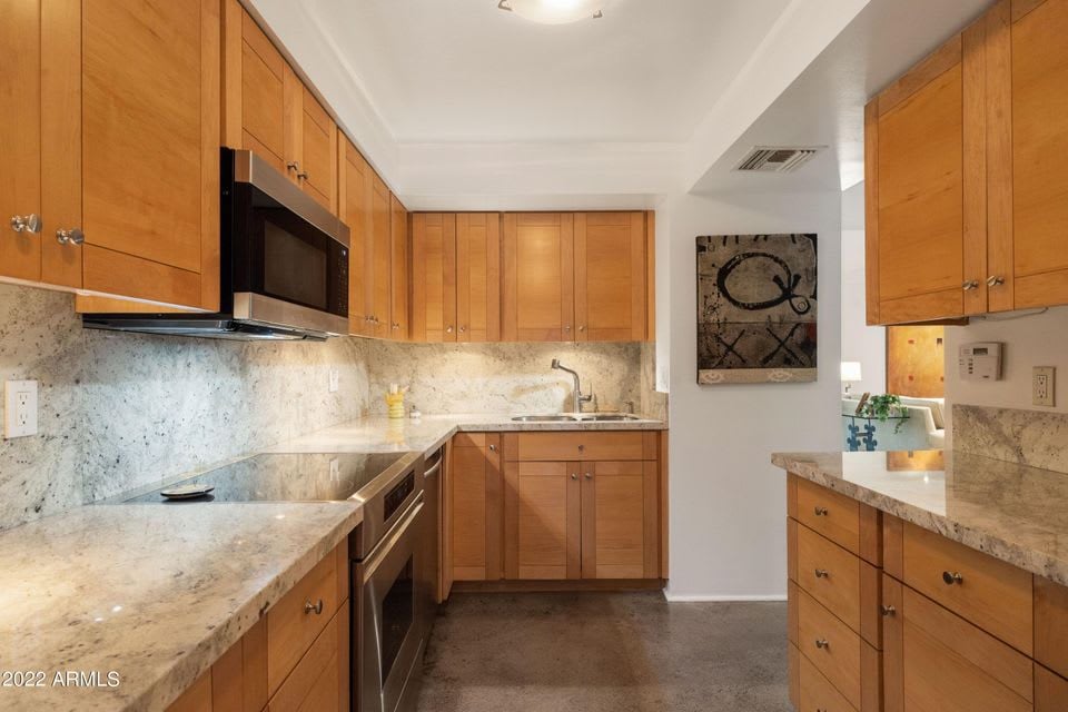 Experience luxurious living in the heart of Phoenix with this award-winning, completely renovated home at Biltmore Terrace!