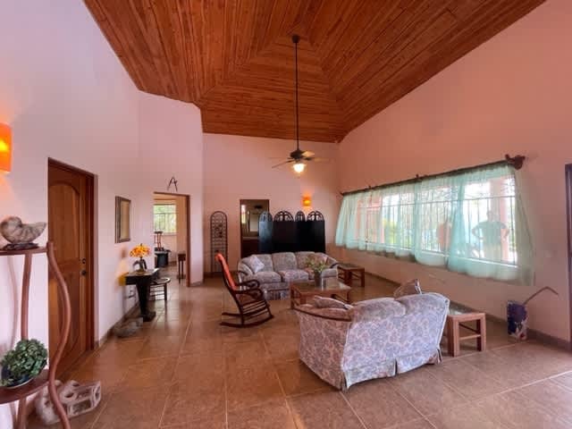 5.2 ACRES – 2 Bedroom Home With 60 Ft Infinity Lap Pool, 1 Bedroom Guest House, Fabulous Ocean View, Mature Fruit Trees!