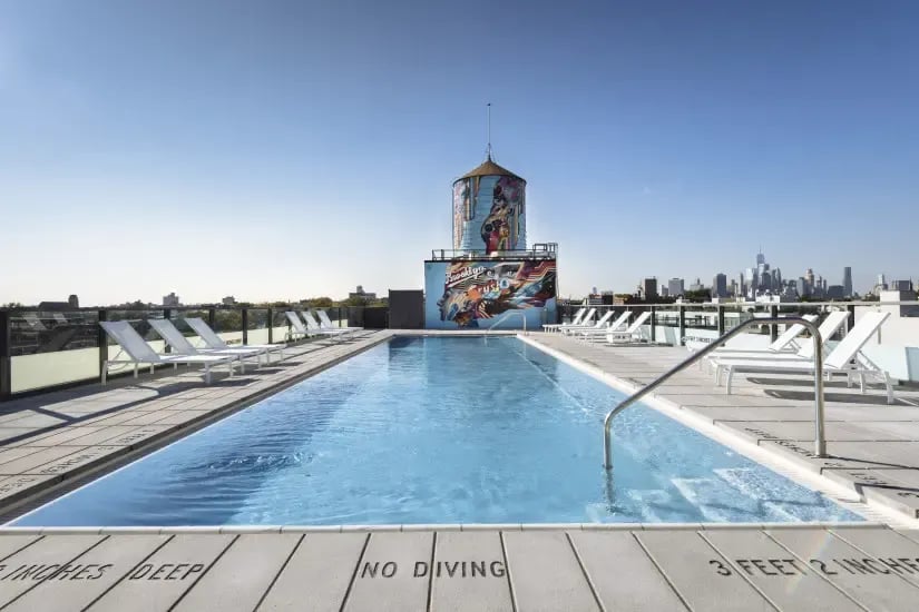 These NYC Buildings Have 'hidden' Amenities Including Wine Tastings, Poolside Barbecues, And Astronomy Hours