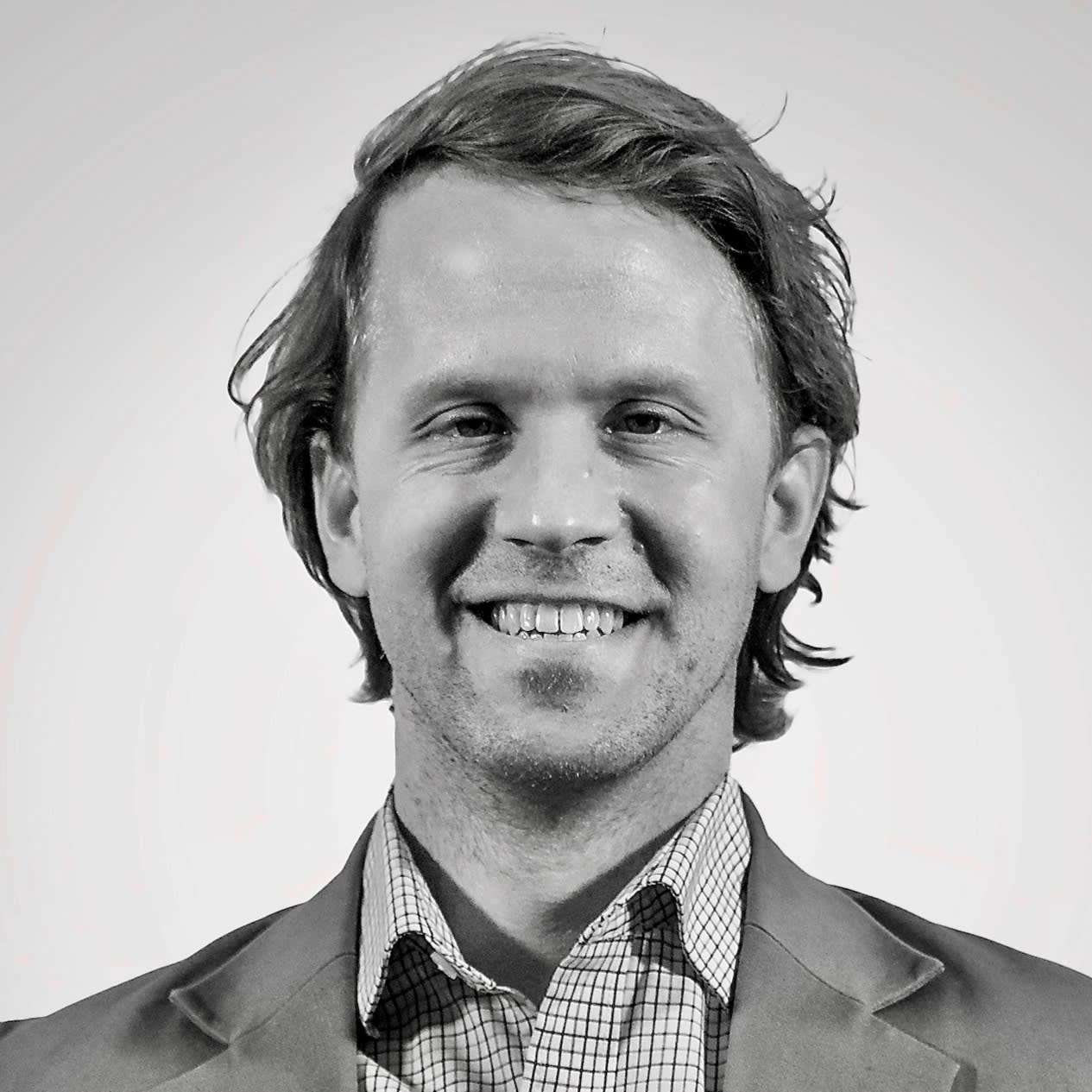 Black and white headshot of Greg Hahnel