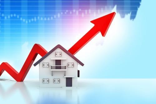 A small white house beneath a bold red arrow rising across a blue market chart.