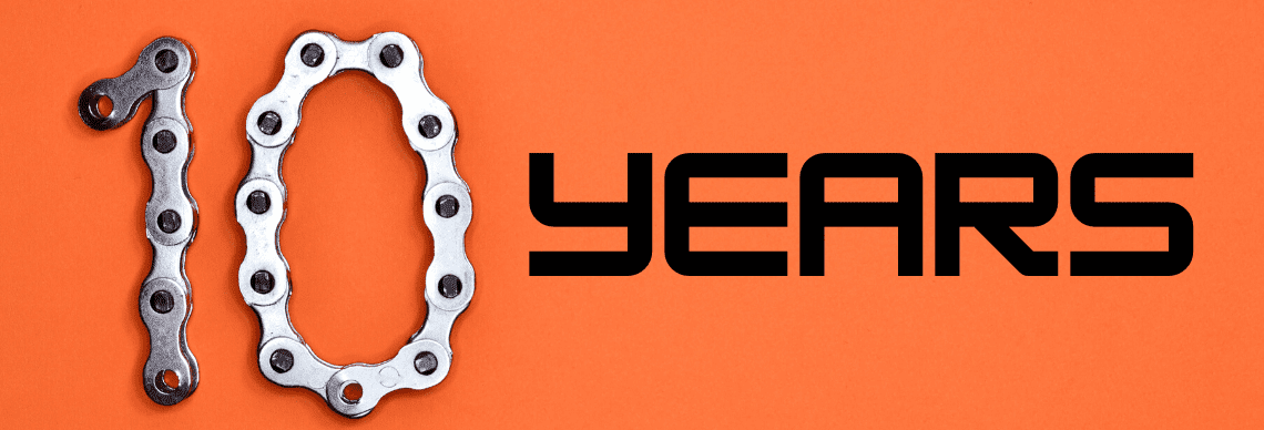 the phrase "10 YEARS" with an industrial and modern theme.