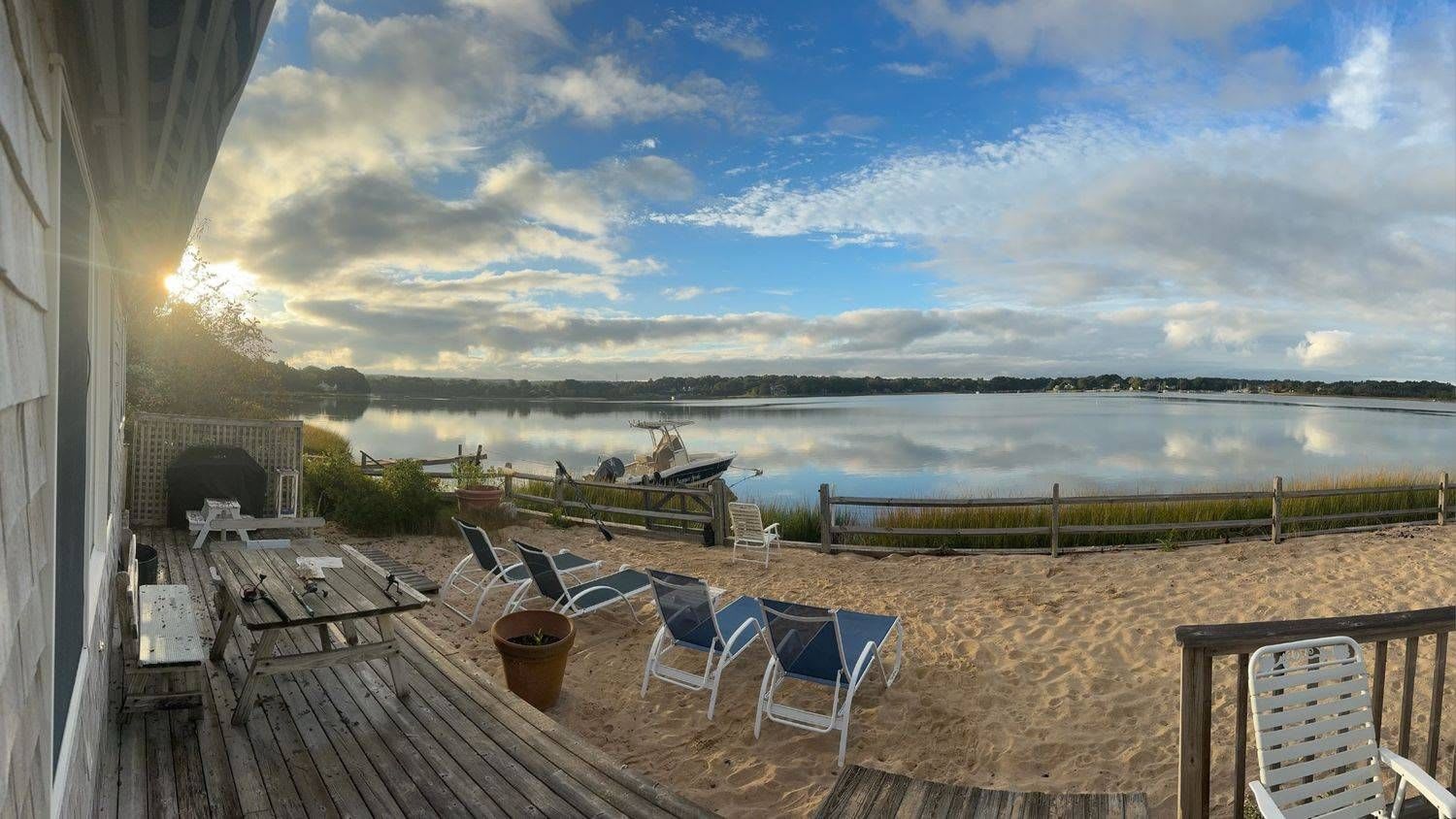 Panoramic Waterfront Vistas in a Coveted Harborside Neighborhood
