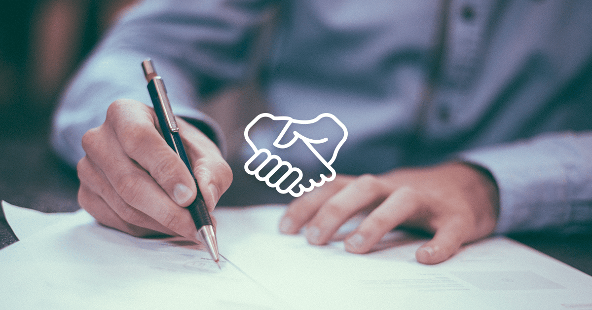 Hands signing paperwork beside a white handshake icon.