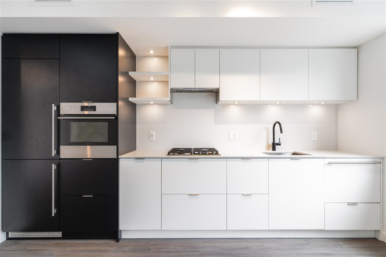 411-210 E 5th Ave