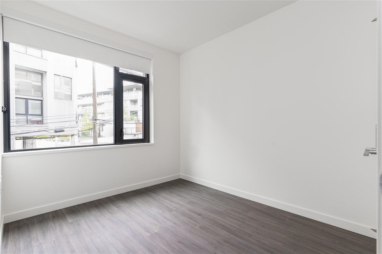 411-210 E 5th Ave