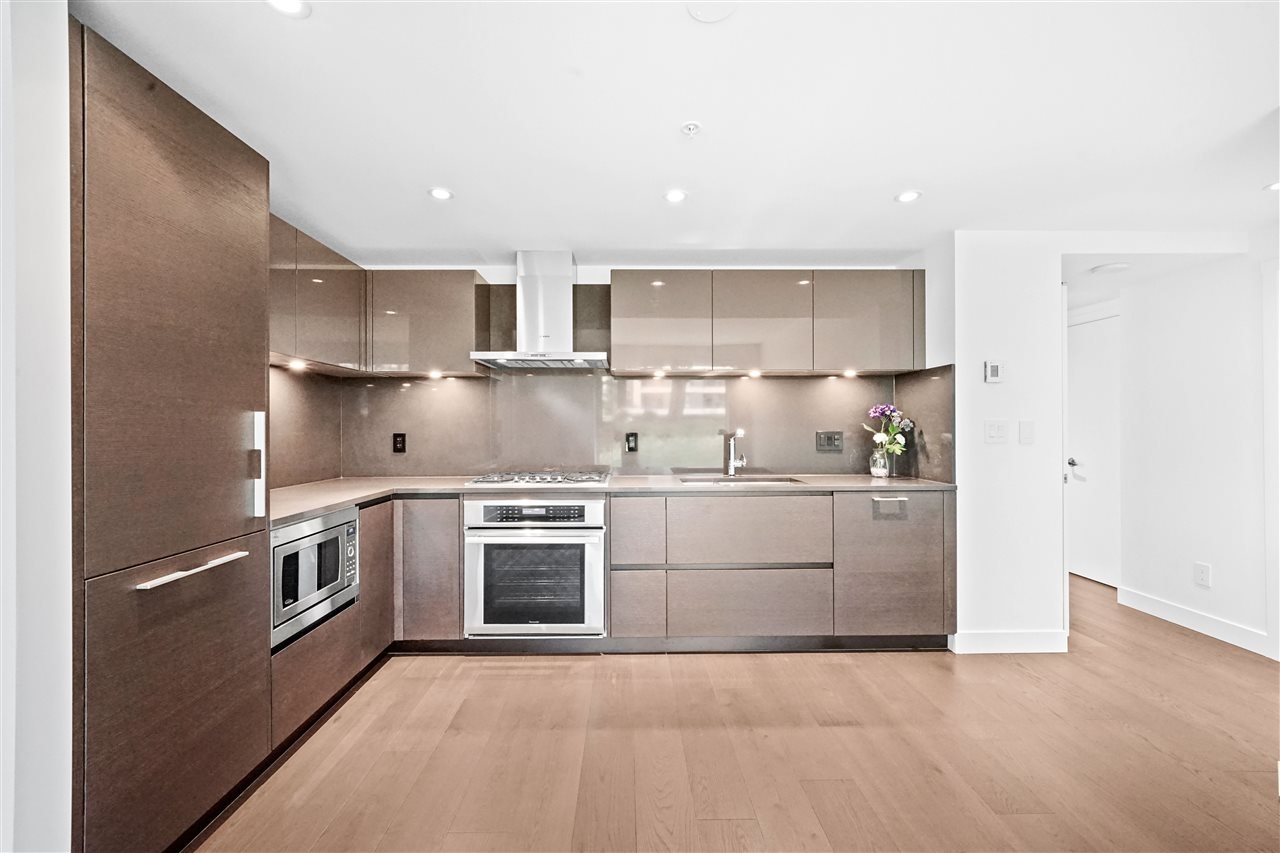 203-7128 Adera St