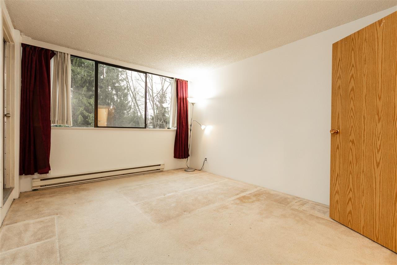 303-9521 Cardston Ct