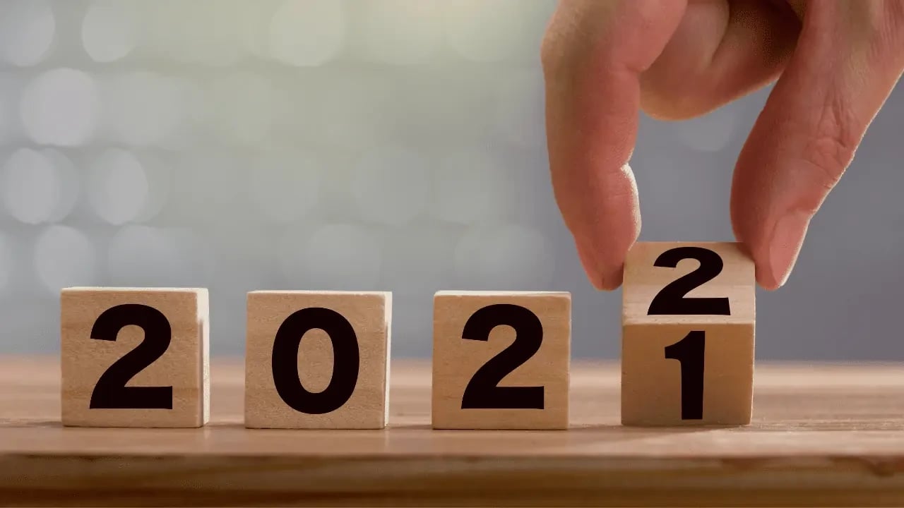 Blocks spelling out "2021" with the "1" being replaced by a "2," symbolizing the transition to the year 2022.