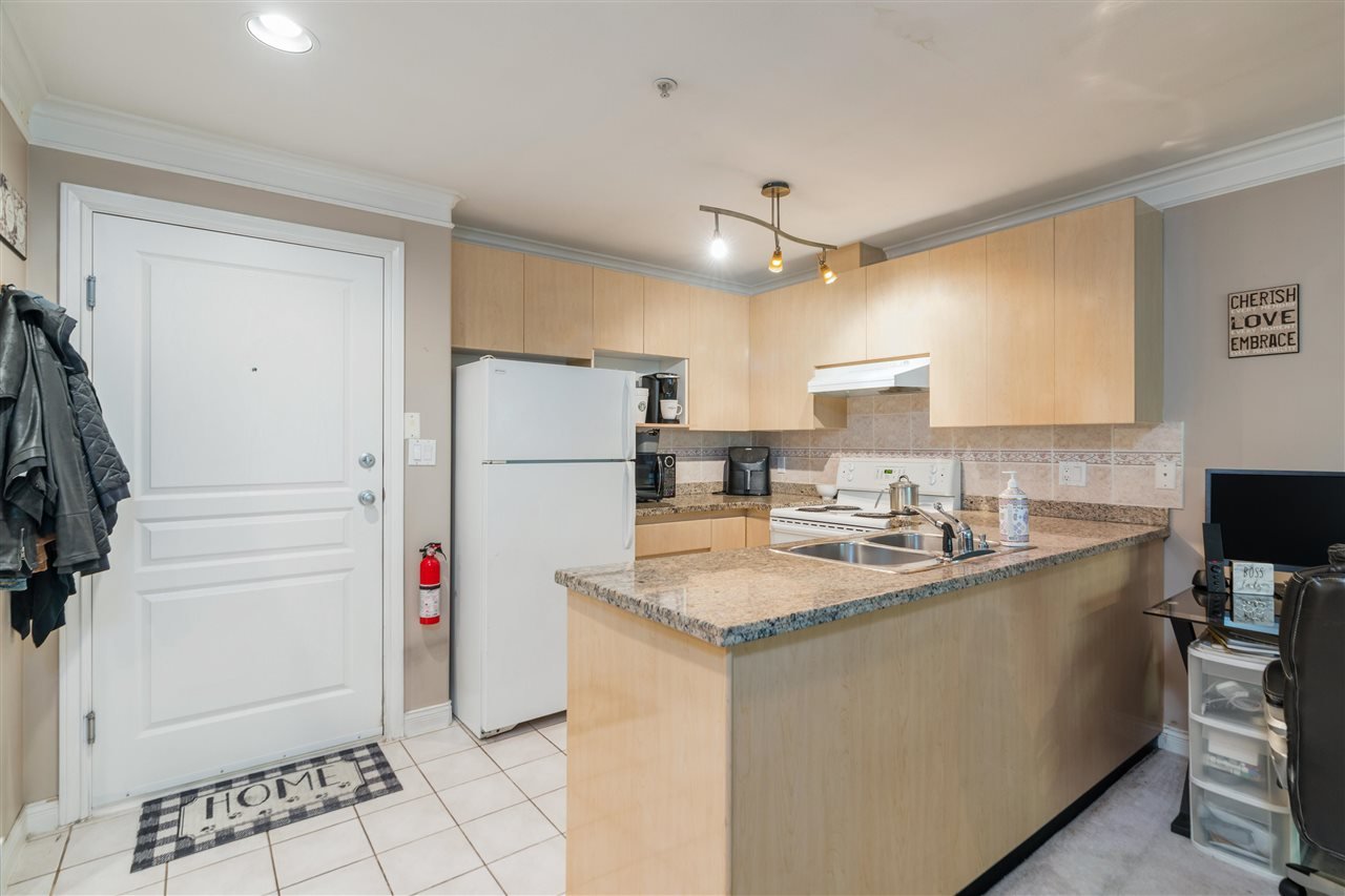 205-8115 121a St