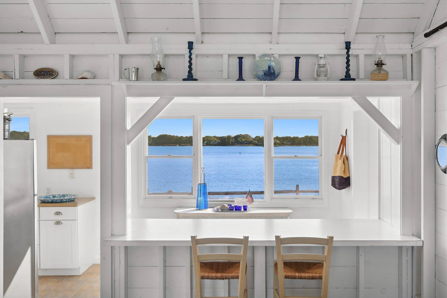 Panoramic Waterfront Vistas in a Coveted Harborside Neighborhood