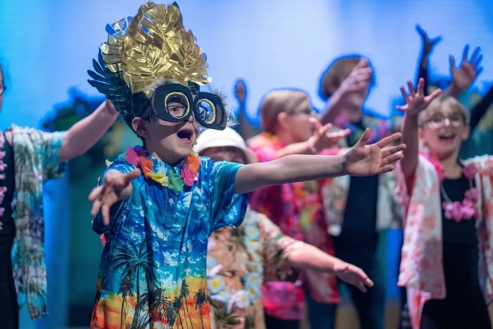 How does the Performing Arts Academy support STAGES’ mission of creating theatre that brings people together?