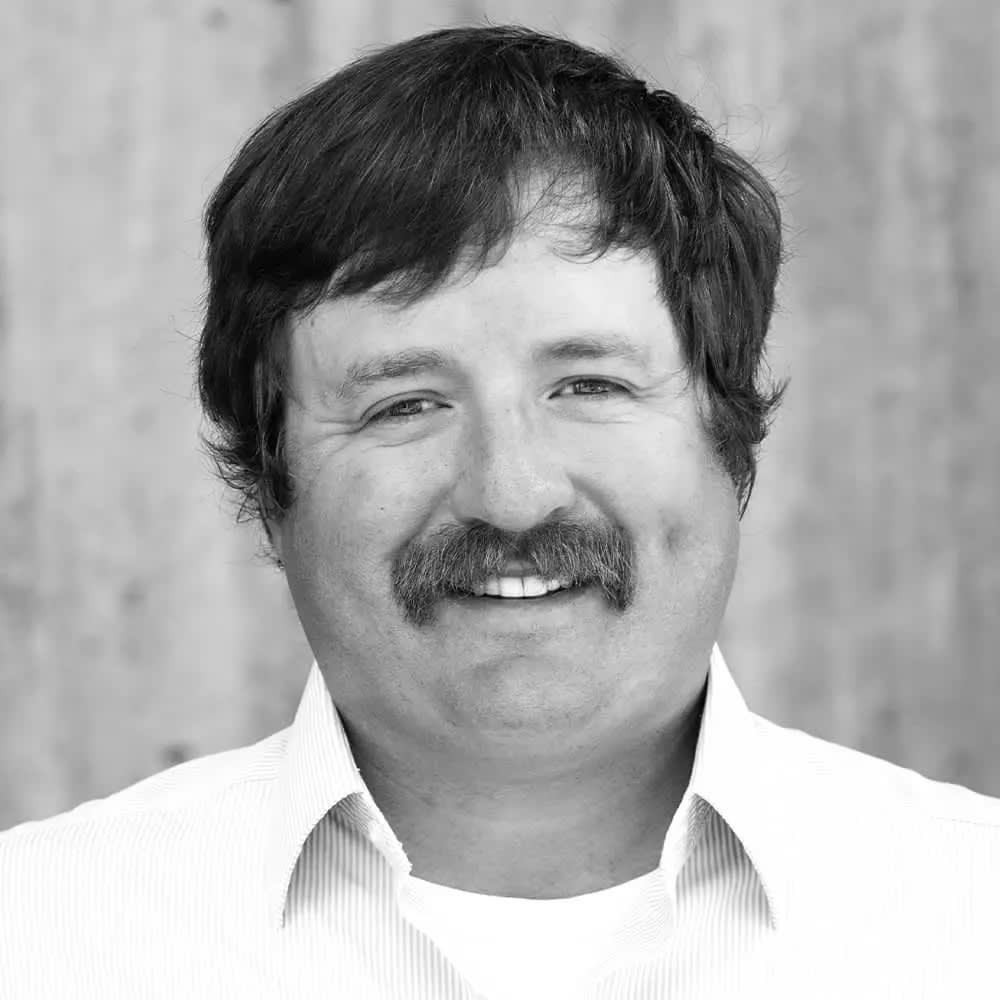 Nick Houfek headshot black and white