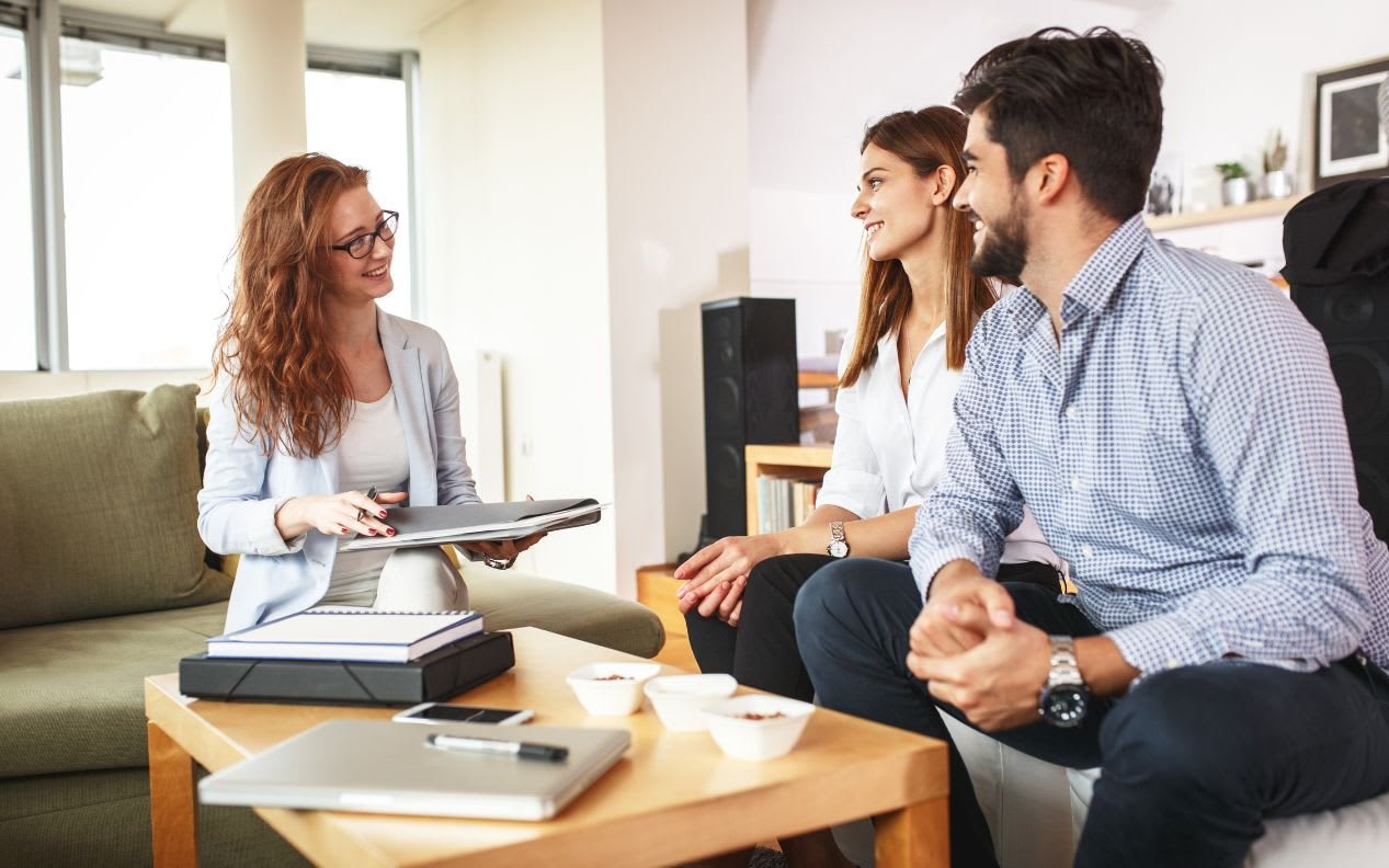 Real Estate Agent Talking to a Couple About Appurtenances