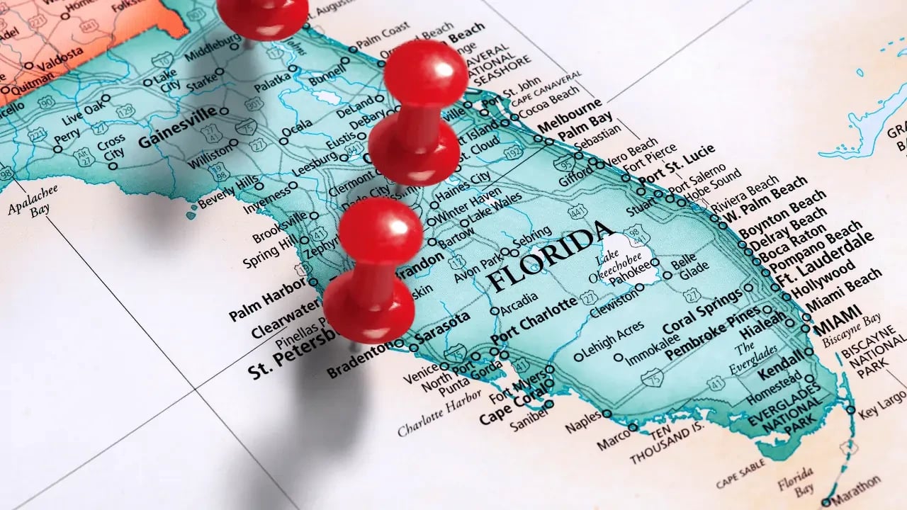 A map of Florida with several red pins marking specific locations. This image likely represents travel, planning, or geographical data.