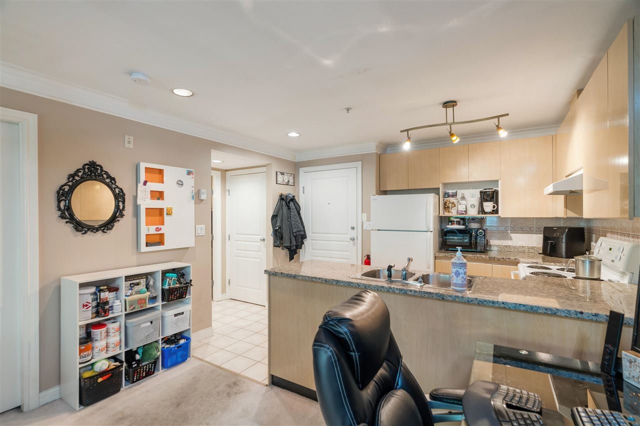 205-8115 121a St