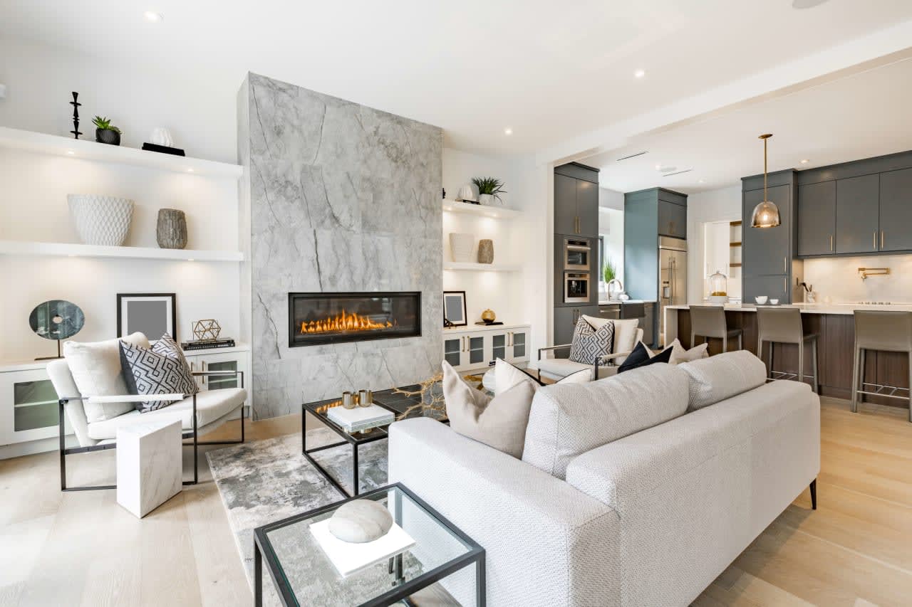 White-Themed Living Room with a Fireplace