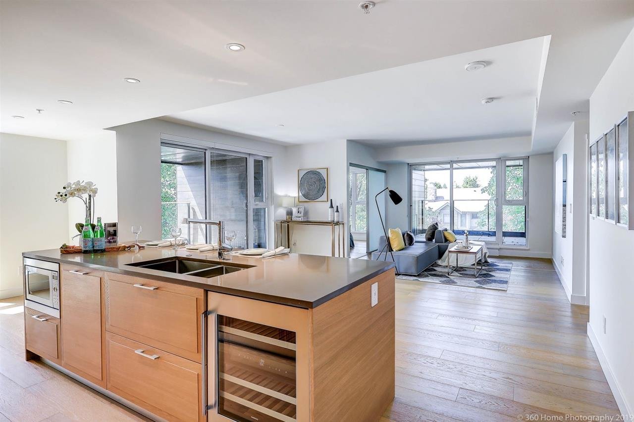 309-1571 W 57th Ave