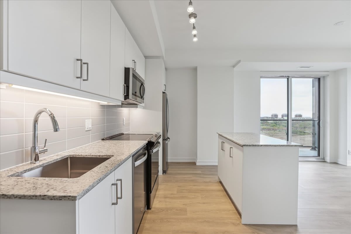 Brand NEW 1 bed+ den in uptown core!