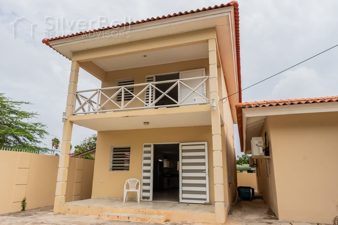 Welcome to this fully furnished apartment, located in Amandelweg, Dominguito, Curaçao where every bedroom is equipped with air conditioning and 5 minutes away from Mambo Beach. SilverBell Realty Advisors - Curaçao