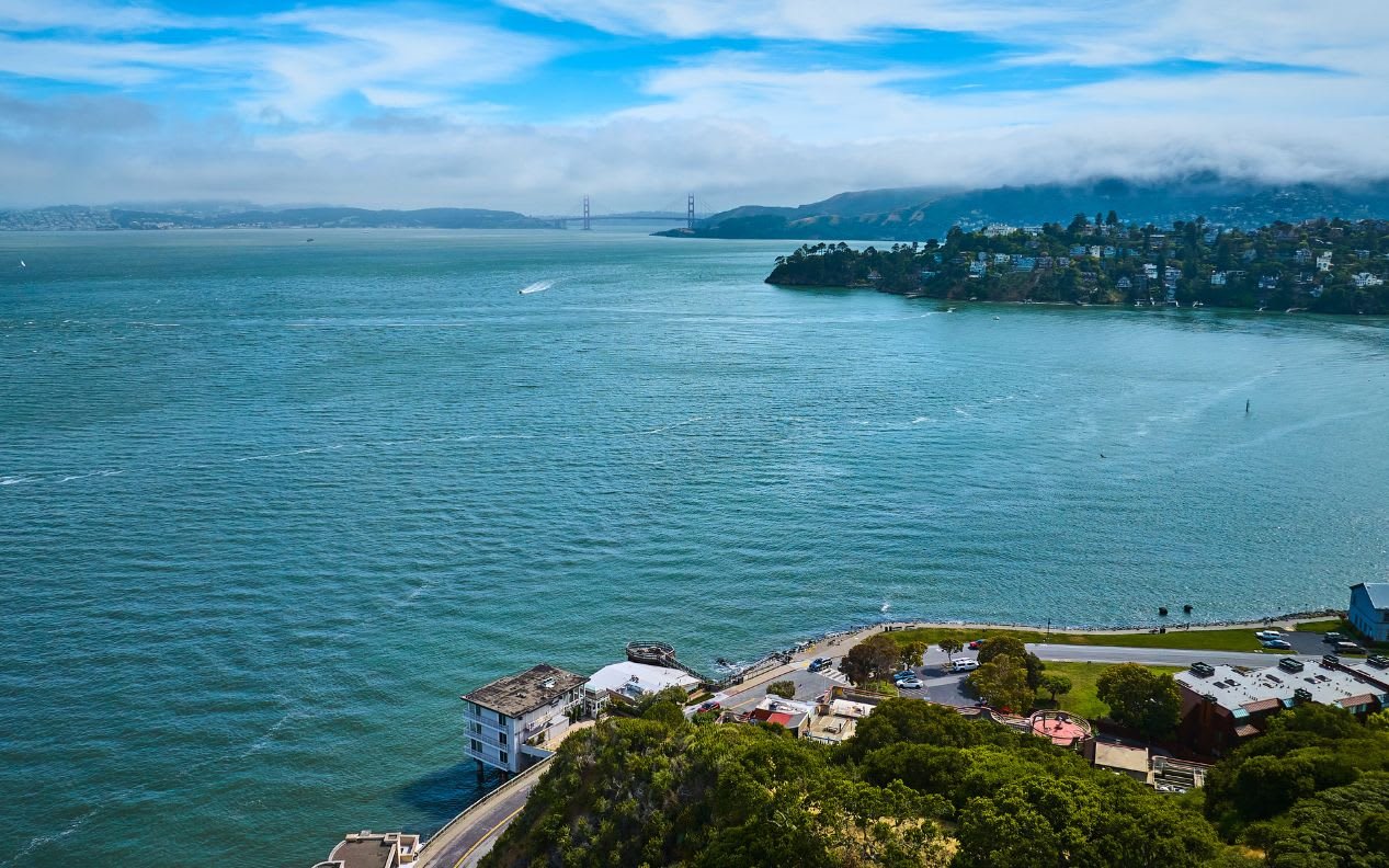 Photo of Aerial Tiburon waterfront properties overlooking San Francisco Bay with Golden Gate Bridge