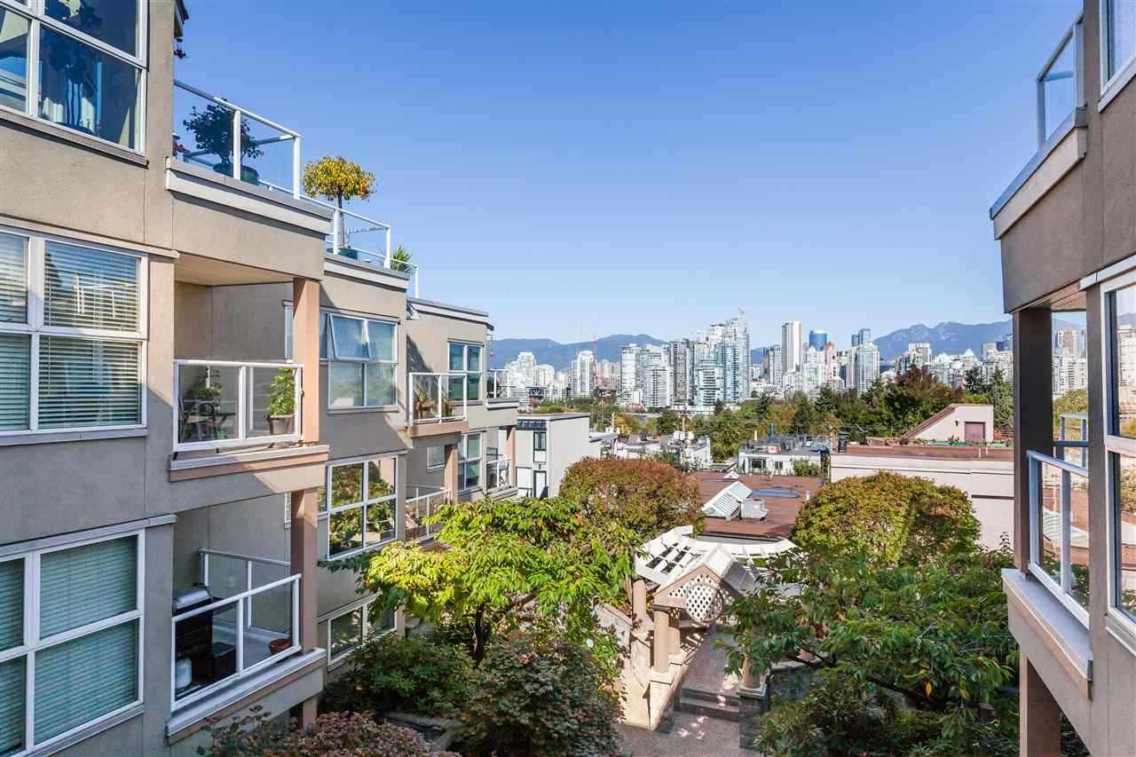 201-933 W 8th Ave