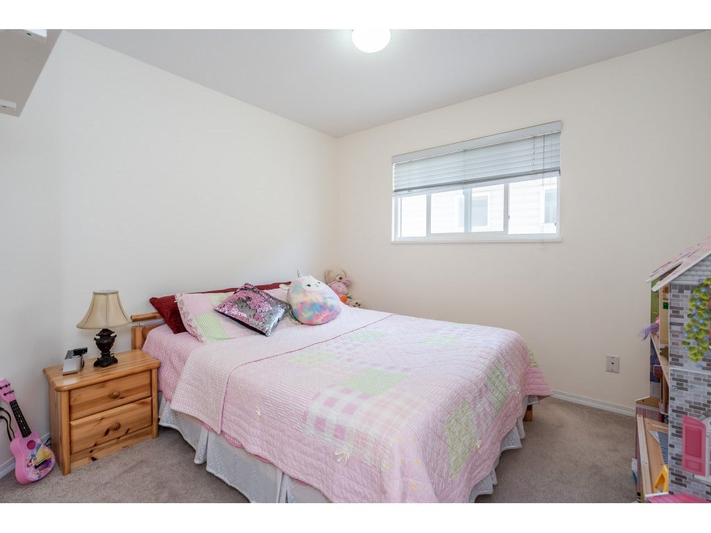 18498 64a Ave