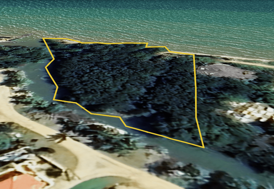 Charming 1.6 acre Caribbean Beachfront peninsular in Dangriga Town, Belize